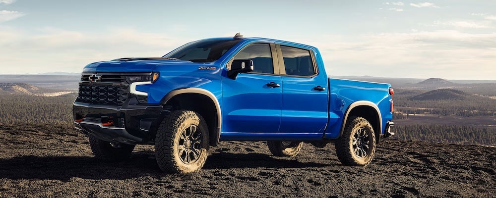 A blue 2025 Chevrolet Silverado 1500 pickup truck